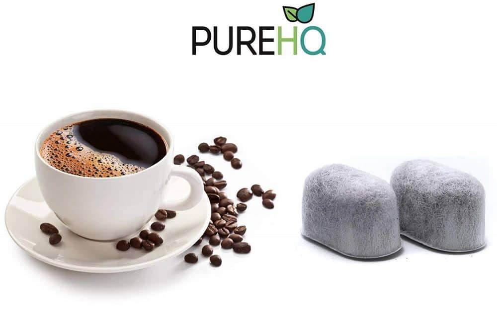 Cuisinart charcoal water filter replacement next to a cup of coffee. Universal fit for Cuisinart coffee makers.