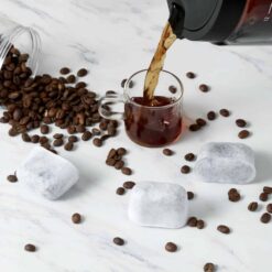 Water Filters for Keurig Coffee Makers: Activated charcoal Keurig water filter replacement shown with coffee beans.