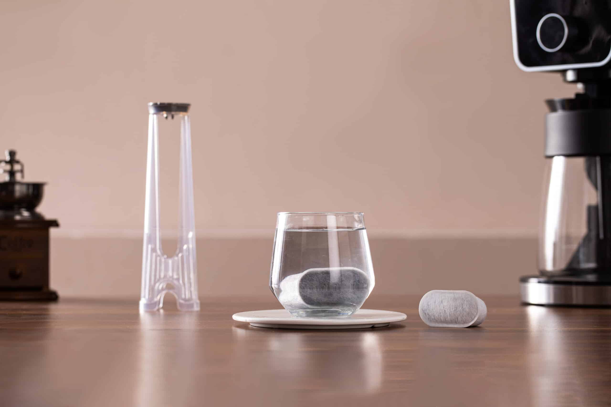 Water filter for Ninja DualBrew Coffee Maker in glass with accessories.