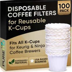Stack of 100 disposable paper coffee filters for reusable K-Cups, fitting Keurig and Ninja coffee brewers.