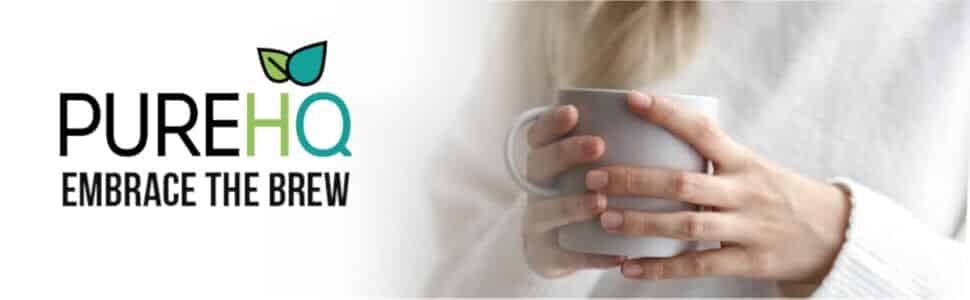 Person holding a mug with the PureHQ logo. PureHQ sells reusable K Cups for Keurig coffee makers.