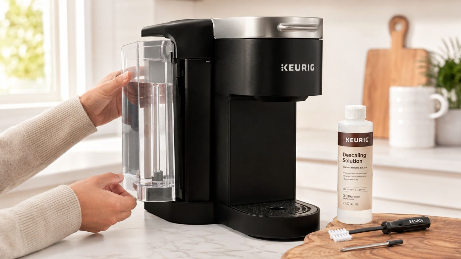 Keurig descaling solution bottle next to a Keurig coffee maker with water reservoir removed